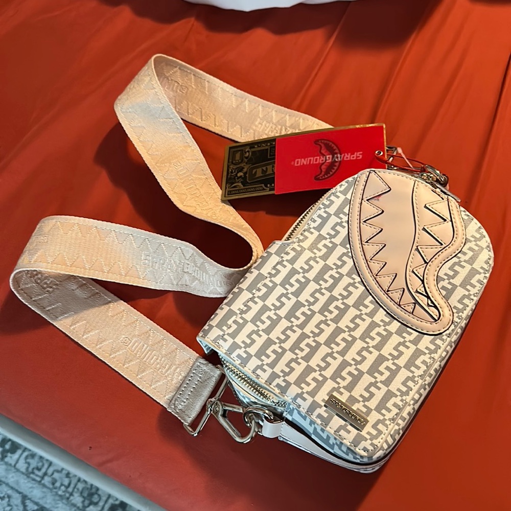 Sprayground creme de la creme sling